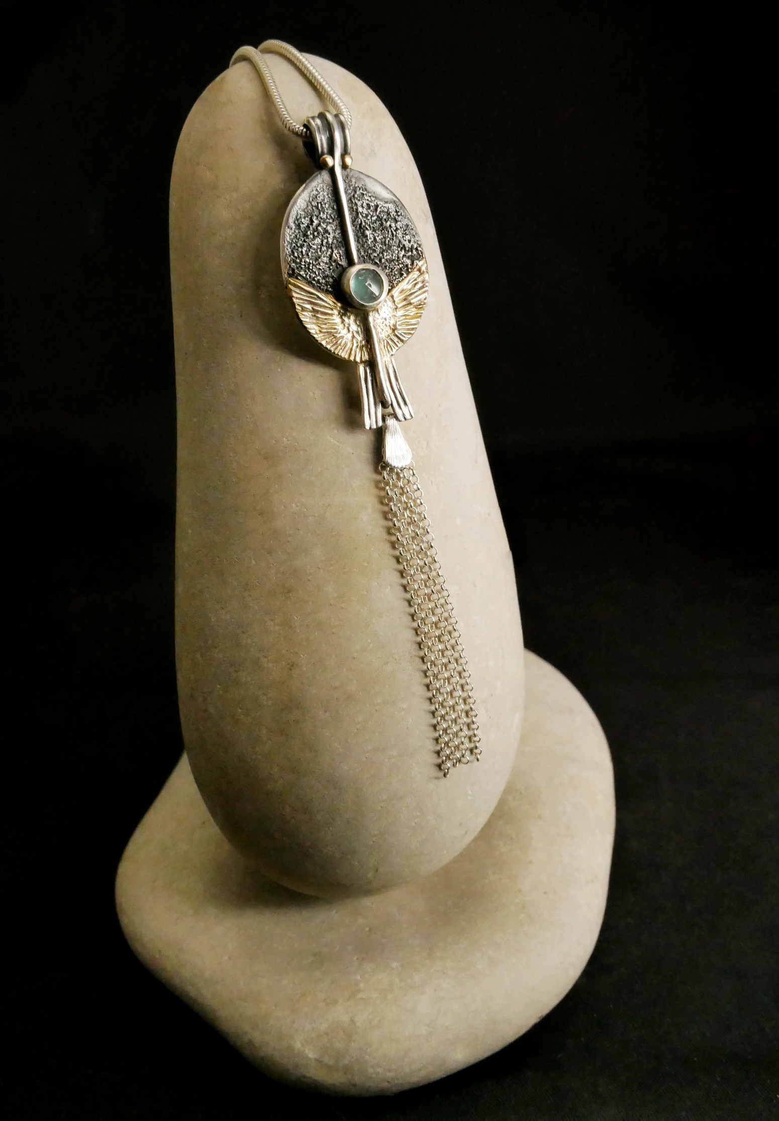 Eliz'art artisan pendant – sterling silver egg, spread 14k gold wings, vertical axis and blue tourmaline, unique creation Bordeaux